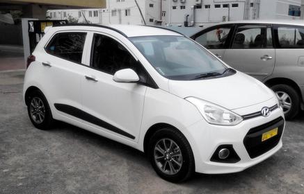 Slider_white-hyundai-grand-i10-official-review-right-side